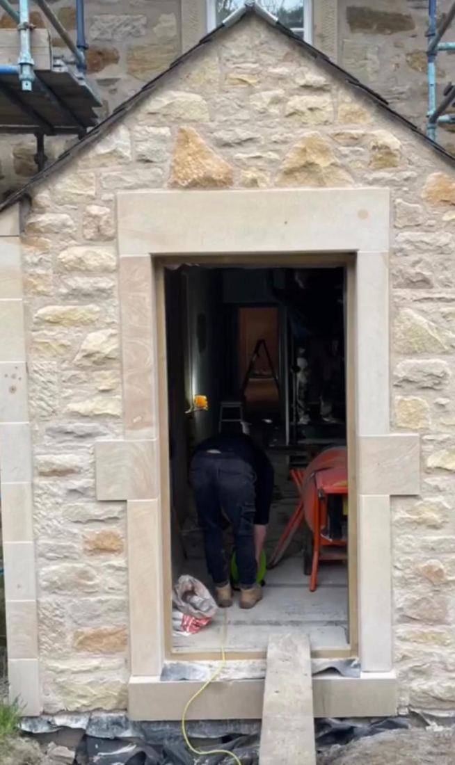 Arched stone porch entrance